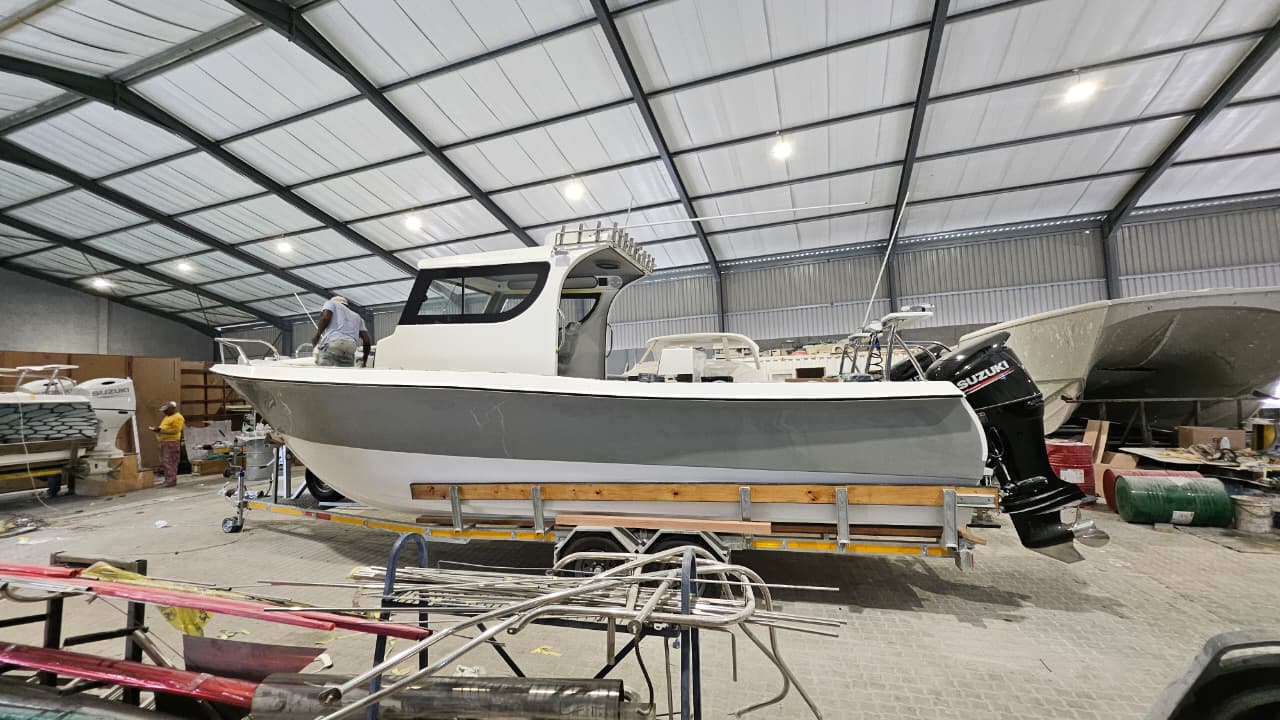 Center Cabin boat on water